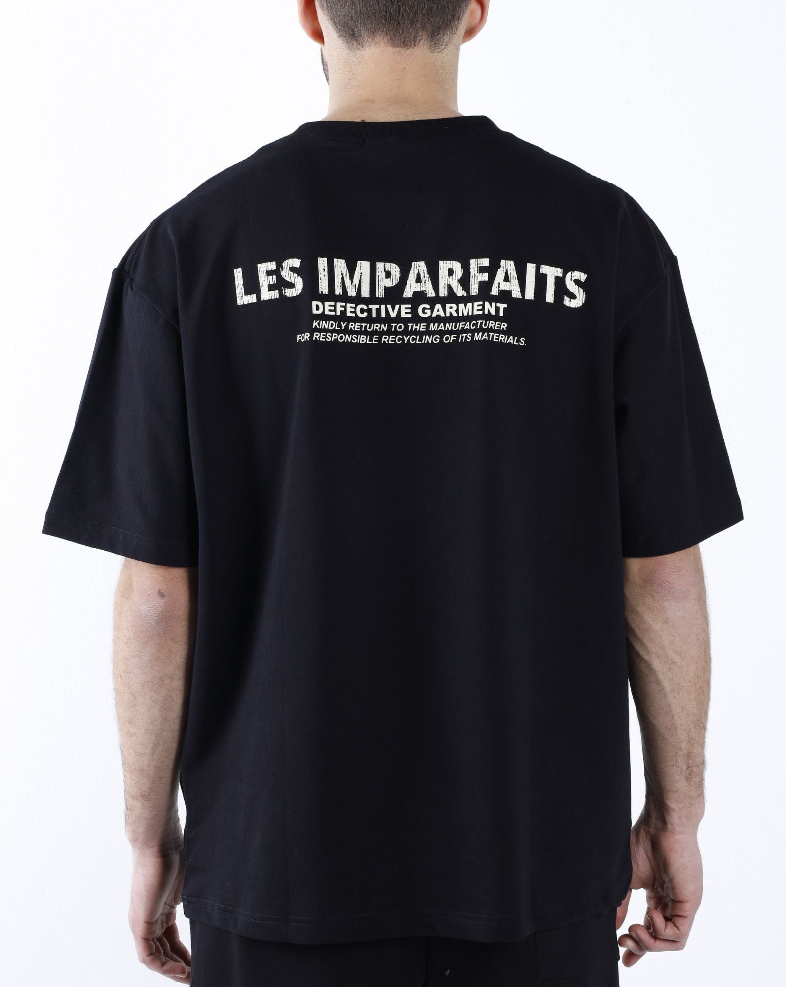 Black "Defective Garment" T-Shirt
