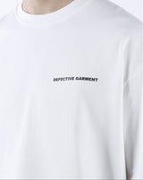 White "Defective Garment"  T-Shirt